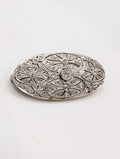 Broche Art Déco nénuphars en or blanc avec diamants taille ancienne
